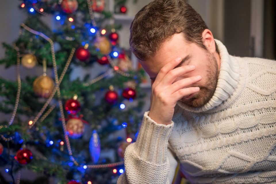 Man feeling depressed and lonely during the christmas time